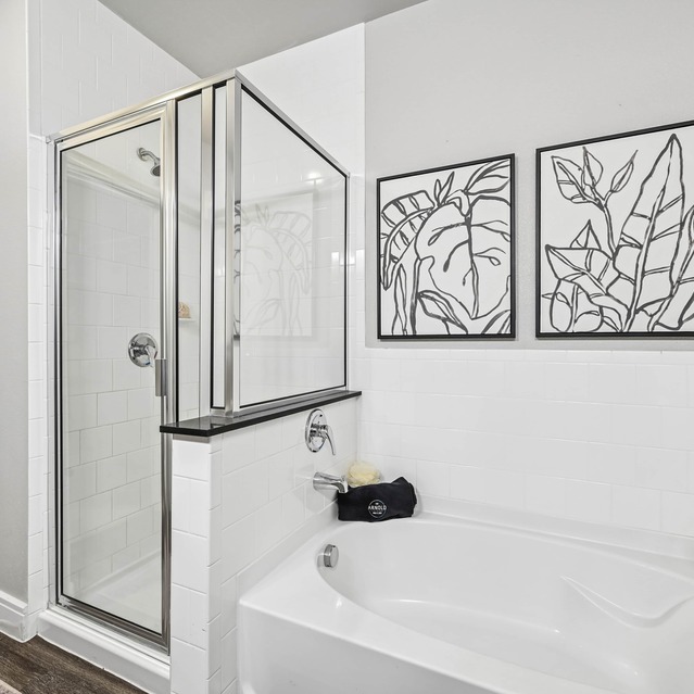 The Arnold - Bathroom with Shower and Tub and access to Extra Closet Storage