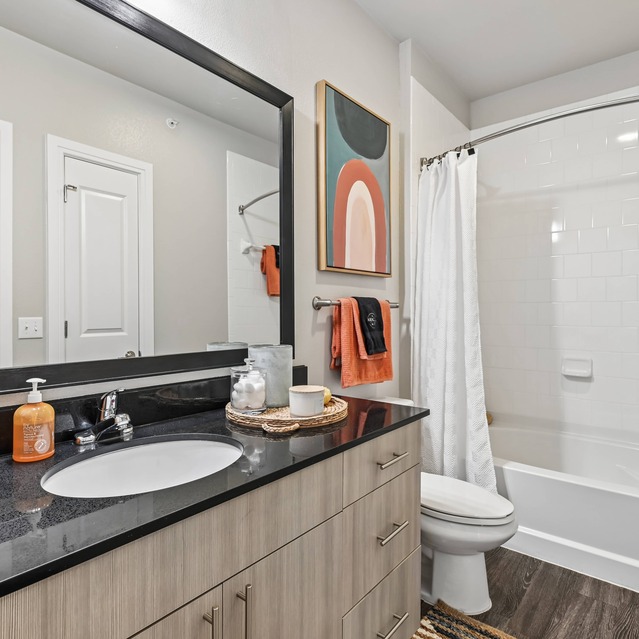 The Arnold - Bathroom with Shower and Tub and access to Extra Closet Storage